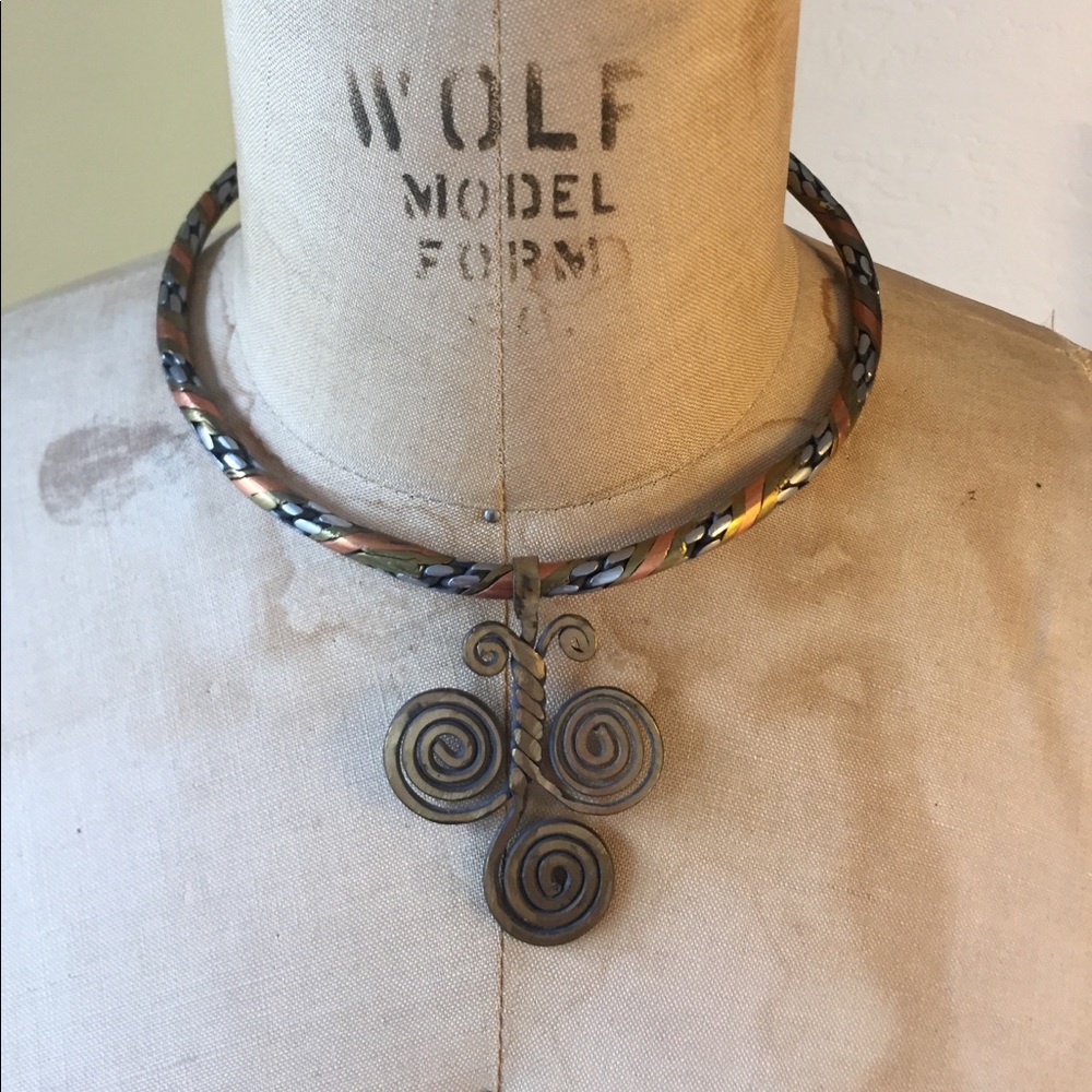 African metal choker w pendant.